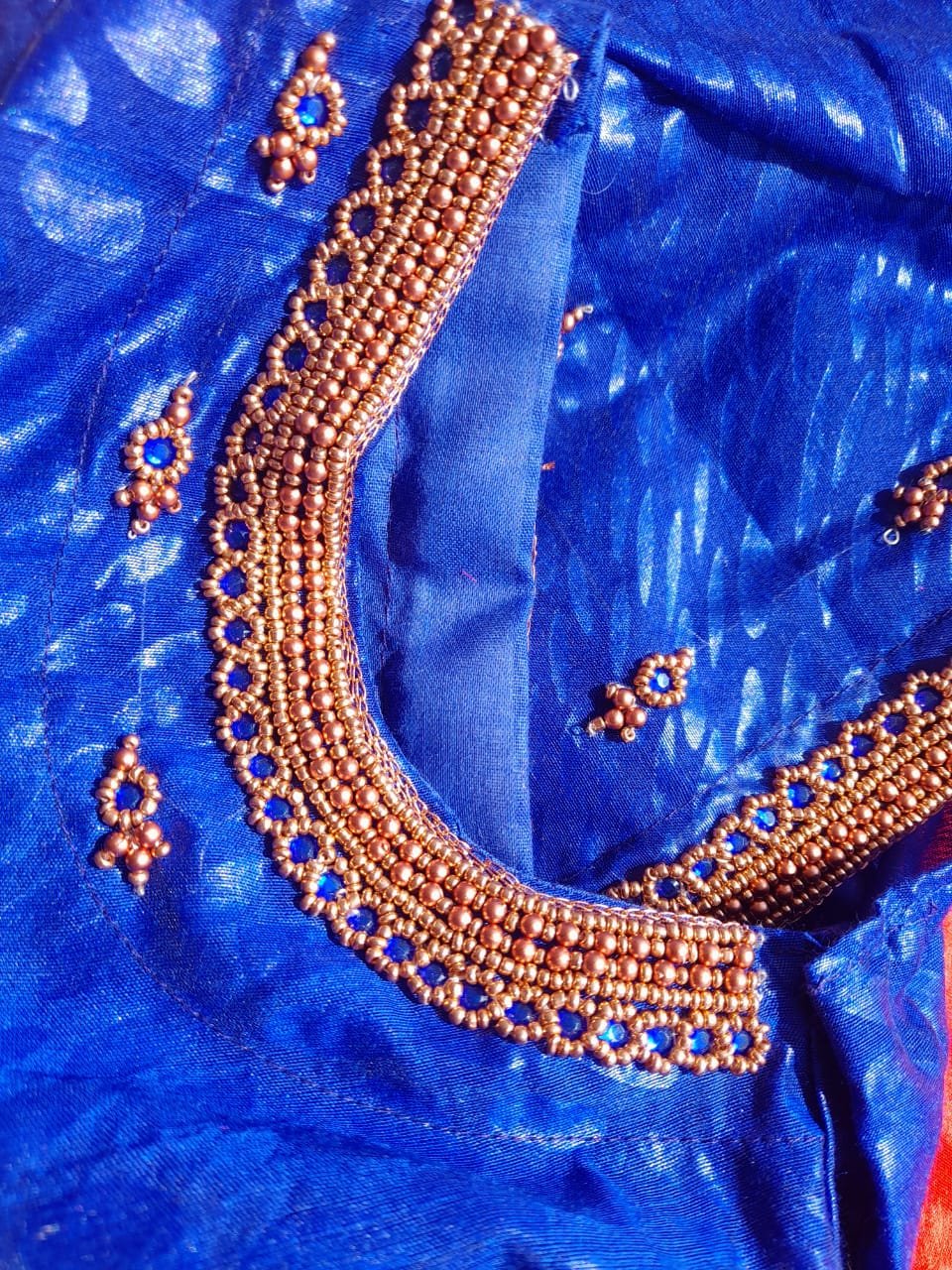 Royal navy blue blouse deep back neck with rich gold maggam zardozi work and stones