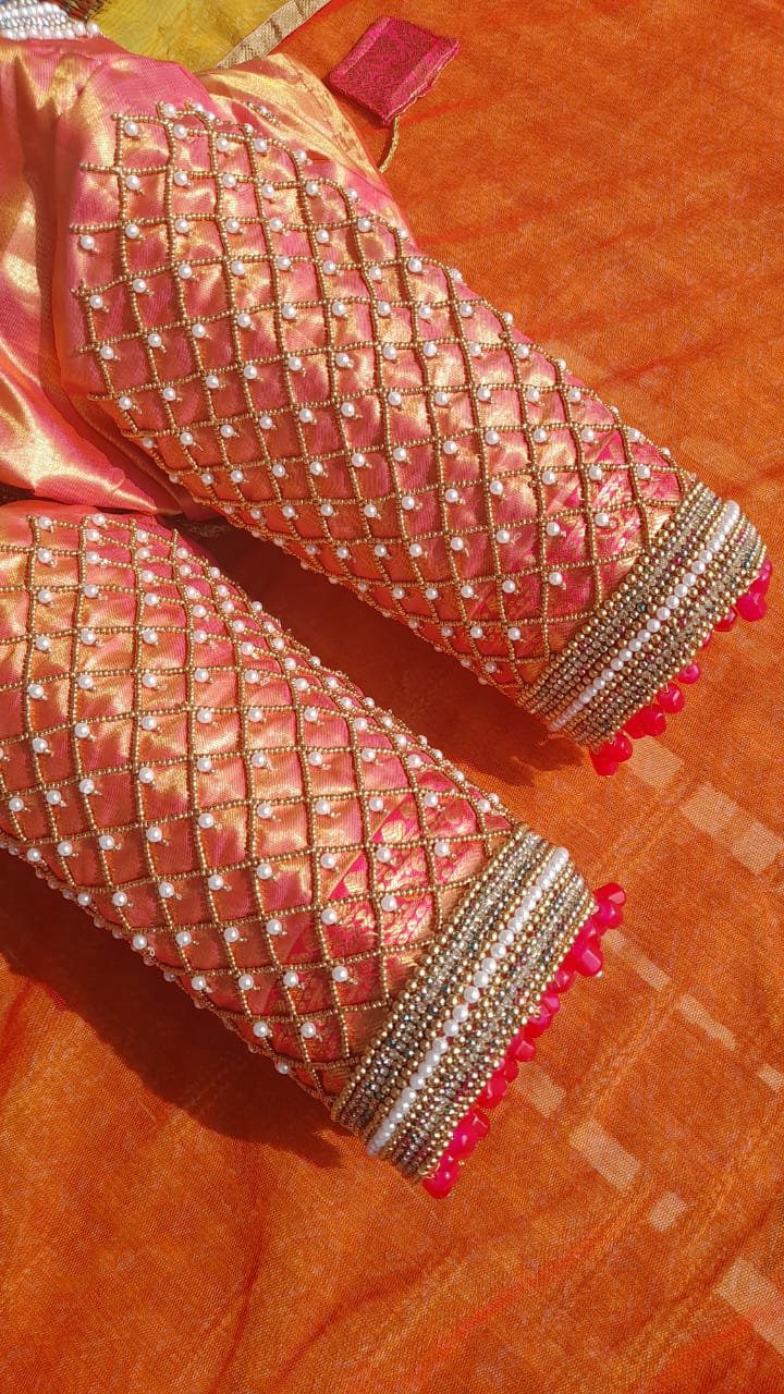 Checked pattern maggam work sleeve with stone flowers and beadwork